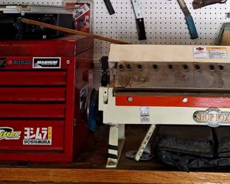 Red garage tool chest plus tools, and Shop Fox M1011 24 adjustable pan and box brake