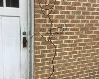 Iron plant holder