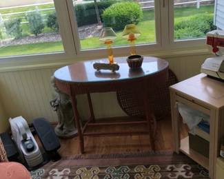 wicker oval table, exercise machine, sewing machine
