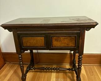 Showing the Sewing Machine cabinet in its closed position.
