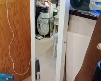 . . . hmmm -- looks like the mirror to a jewelry armoire