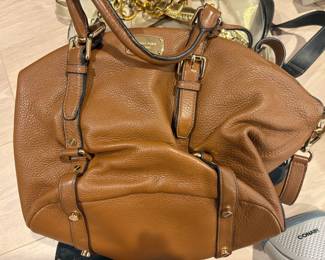 . . . and a Michael Kors purse