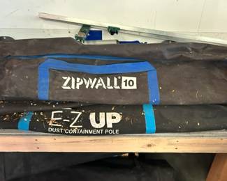 Zipwall & E-Z Up dust containment pole sets.