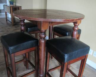 Bar height table - this table can be lowered to regular table height or coffee table height.