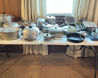 Lots of pots and pans including Magnalite and cast iron.