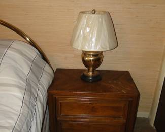 Side table with an outstanding brass lamp. We have two, and this is one of two