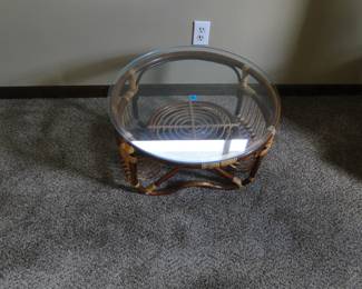 Rattan and glass topped table
