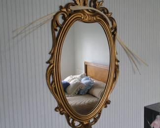 Very much an Art Deco frame, with palm frond
