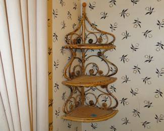 Three tiered wicker corner shelf 