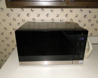 Microwave. BEEP BEEP, dinners done!