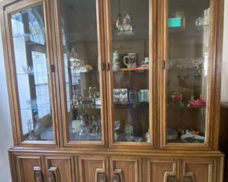 Mid century China cabinet with brass hardware.