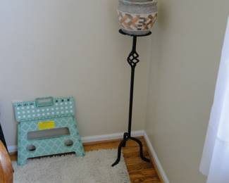 Tall plant stand with an amazing planter on top