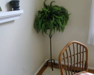 Tall plant stand with one faux fern