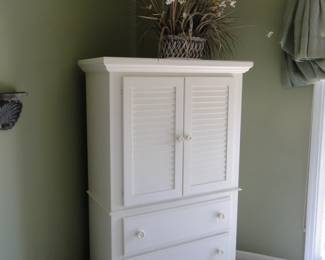 Nice white entertainment center, or great cabinet for storage of all other items too