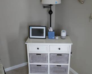 Very nice floor lamp, and some wonderful storage options too