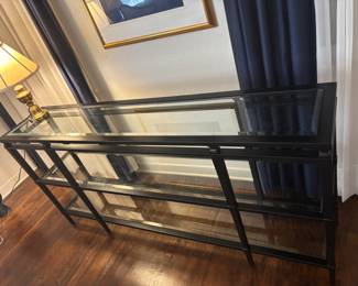 Black metal and glass sofa table. 68”w 14”d 32”t.   $ 250.00