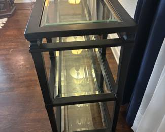 Black metal and glass sofa table. 68”w 14”d 32”t.   $ 250.00