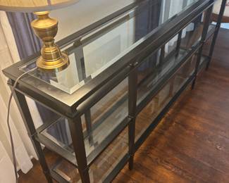 Black metal and glass sofa table. 68”w 14”d 32”t.   $ 250.00