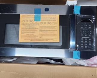 New in box GE microwave