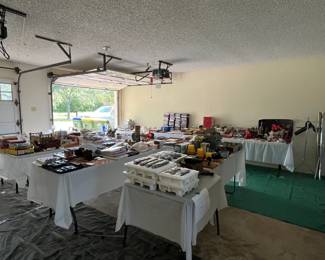 Garage full of miscellaneous tables