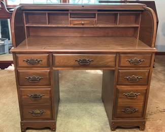 Rolltop desk with seven drawers