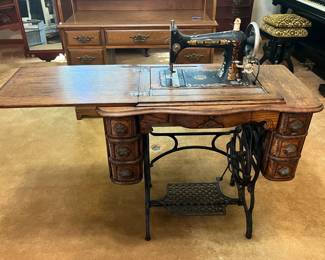 Antique New Baldwin sewing machine and console pedal table