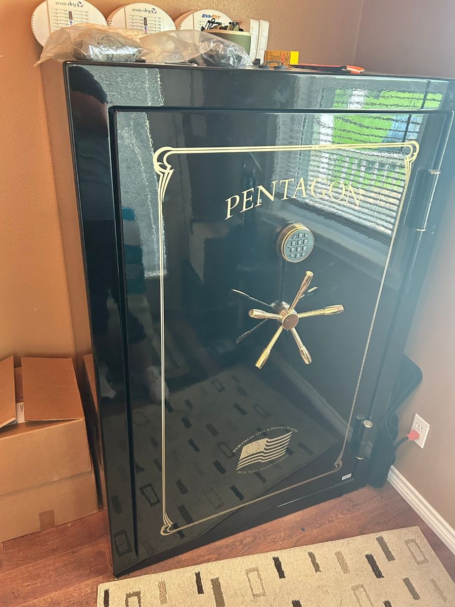 Pentagon Safe
Holds at least 36
Lighted.
Must be able to move and load yourself. There are double doors directly across from it to move it outside onto concrete porch to load.
40” across x 25” deep x 59” tall