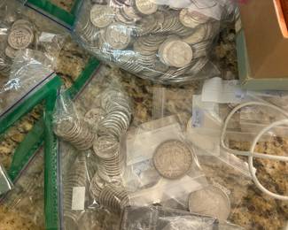 Junk Silver Dimes, Quarters, Halves, Silver Dollars - 90% silver pre-1964
Roosevelt Dimes: Mercury Dimes; Washington Quarters; Standing Liberty Quarters; Franklin & Kennedy Halves; Peace Dollars, etc
