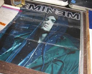 Eminem poster and figurine