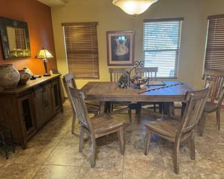 Dinette set has two additional leaves.