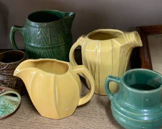 Vintage McCoy Pottery Pitchers
Add a splash of retro charm with these vintage McCoy pottery pitchers, featuring a rich yellow glaze and iconic mid-century design. Beloved by collectors, these functional yet decorative pieces bring timeless character and history to any kitchen or display.