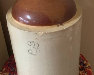 Rustic Two-Toned Stoneware Jug – Brown Glaze with Hand-Painted Swirl
Bring vintage charm into your space with this classic ceramic jug featuring a rich brown glazed top, a smooth cream base, and a graceful hand-painted black swirl design. Whether displayed on a braided mat or styled in your farmhouse kitchen, this piece exudes warmth, craftsmanship, and nostalgic appeal. Perfect for collectors or anyone looking to add a touch of rustic elegance to their decor.