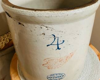 Vintage Red Wing 4-Gallon Stoneware Crock – Collectible Americana
This authentic Red Wing 4-gallon crock features the iconic red wing emblem and cobalt “4” capacity stamp, representing a cherished era of American craftsmanship. Crafted from durable, nonporous stoneware, it was originally used for food storage and fermentation before the age of refrigeration. A perfect piece for collectors or those seeking rustic charm, this crock brings both history and functionality into any space.