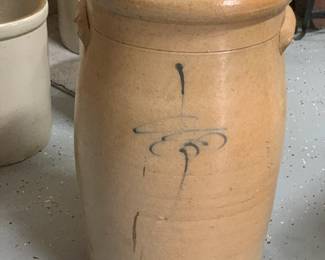 Antique Salt-Glazed Stoneware Butter Churn – 19th Century Charm
This classic butter churn showcases timeless utility with rustic beauty. Likely dating to the late 1800s or early 1900s, it features salt-glazed stoneware construction and a sturdy hand-crank mechanism. A must-have for collectors of farmhouse antiques or those looking to add an authentic touch of vintage charm to their space.