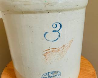 Authentic Red Wing 3-Gallon Stoneware Crock – Circa Early 1900s
This classic 3-gallon crock from Red Wing Stoneware Co. features the signature cobalt “3” and iconic red wing logo, identifying it as an original early 20th-century piece (circa 1906–1930). Traditionally used for fermenting sauerkraut, pickling vegetables, or storing salted meats, its rugged, watertight construction made it a staple of American kitchens. Today, it remains a favorite among collectors and vintage décor enthusiasts for its historical charm and practical beauty.