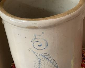 intage Red Wing Stoneware Crock – 5 Gallon with Blue Leaf Motif
Add timeless charm to your home with this beautifully preserved Red Wing stoneware crock, featuring the signature blue birch leaf design. Crafted by the historic Union Stoneware Company of Red Wing, Minnesota, this 5-gallon crock showcases the durability and rustic elegance of early American pottery. With its smooth glazed finish and subtle vintage character, it’s perfect as a functional storage piece or decorative accent in any farmhouse or vintage-inspired setting.