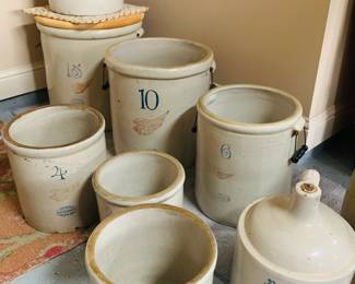 Vintage Red Wing Stoneware Crock Collection – Sizes 3 to 15
This image highlights a beautiful assortment of authentic Red Wing stoneware crocks and jugs, ranging from 3 to 15 gallons. Each piece features classic blue number stamps and the iconic red wing emblem, representing the finest in early American craftsmanship. With their rich cream glaze and occasional wooden lids, these crocks offer both rustic charm and versatile functionality—ideal for collectors, decorators, or anyone seeking that cozy farmhouse touch.