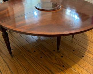 Demi- lune folds out to this beautiful round cocktail table!!