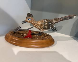 Ceramic Roadrunner vs Snake Statue