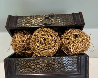 Small wooden Trunk with grapevine spheres/balls