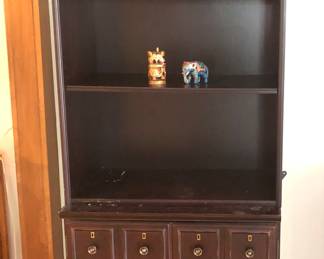 Bottom is a cabinet, not drawers