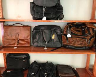 Fine leather men’s bags packs brief cases 