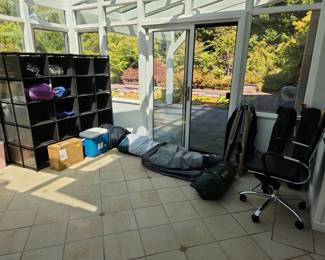 Camping gear - chairs, cooler, tent, sleeping bags, and inflatable sleeping pads