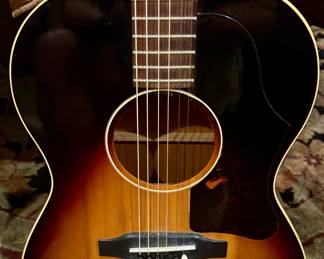 Rare Vintage Gibson LG-1 Sunburst Circa 1960's Gibson LG-1 Acoustic Guitar. with New Strings. Truly a beautiful instrument.