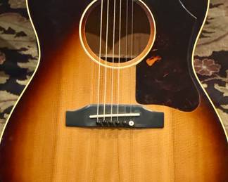 Rare Vintage Gibson LG-1 Sunburst Circa 1960's Gibson LG-1 Acoustic Guitar. with New Strings. Truly a beautiful instrument.