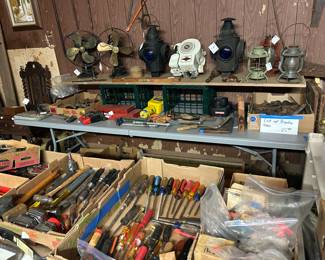 Green shag room. Railroad lanterns, tools primitives