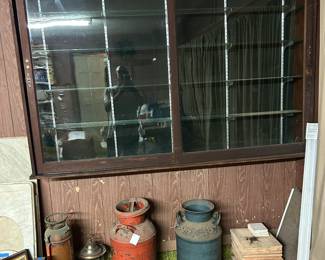 antique wall mounted store fixture with glass shelves, buyer must remove.