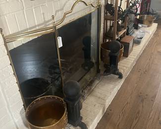 Cast iron, antique cannonball fireplace andirons, heavy brass fireplace screen