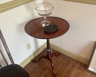Cherry wood table with slipper feet.