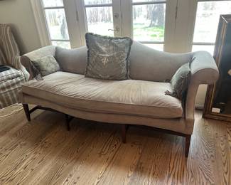Camel back sofa in sage crush velvet